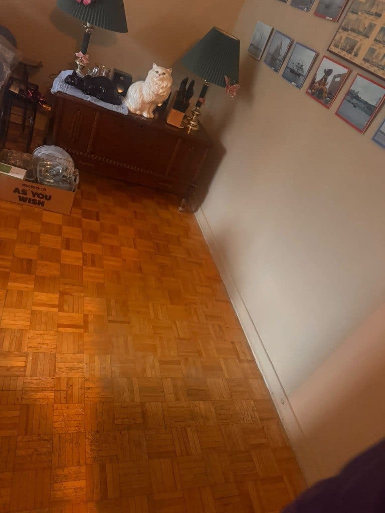 The same room after the sofa was hauled away